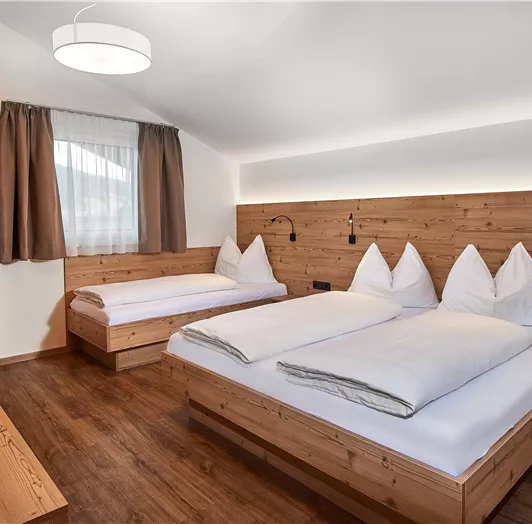 Appartement E Schlafzimmer