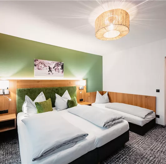Hotel Schuetzenhof Flachau dreibettzimmer