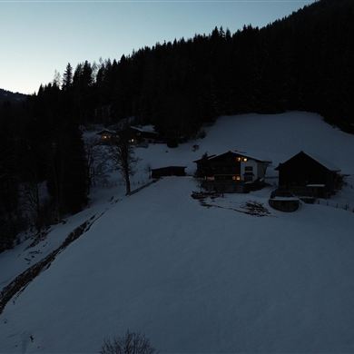 House in winter in the evening