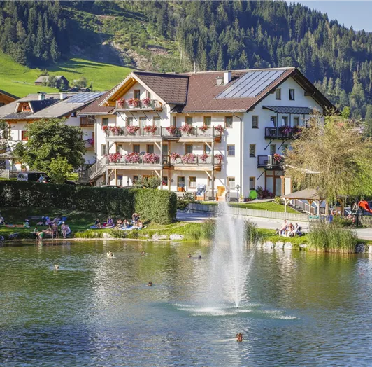 view of the house with the swimming lake