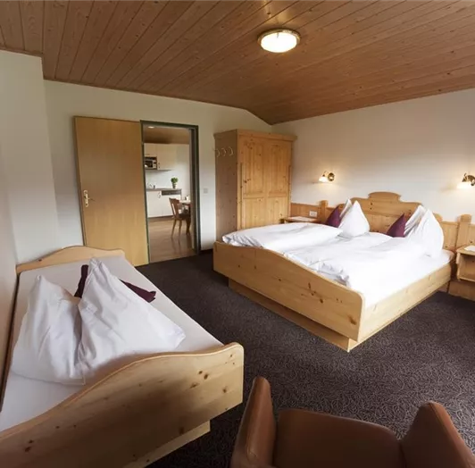 Schlafzimmer mit Zusatzbett